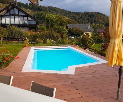 Réalisation Piscine Coque en Suisse par Oberson Piscines Ibiza